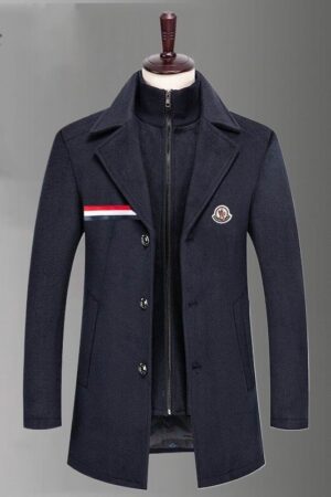 Brown or tan wool-blend Moncler long overcoat with a zip-in mock-neck knit inner layer, tricolor trim on the chest pocket, and a Moncler logo patch on the lapel