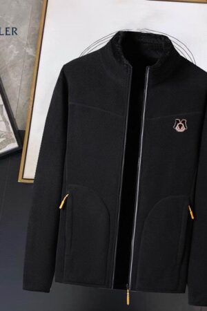 Moncler fleece jacket with a full zip closure, standing collar, and the Moncler logo patch on the chest.
