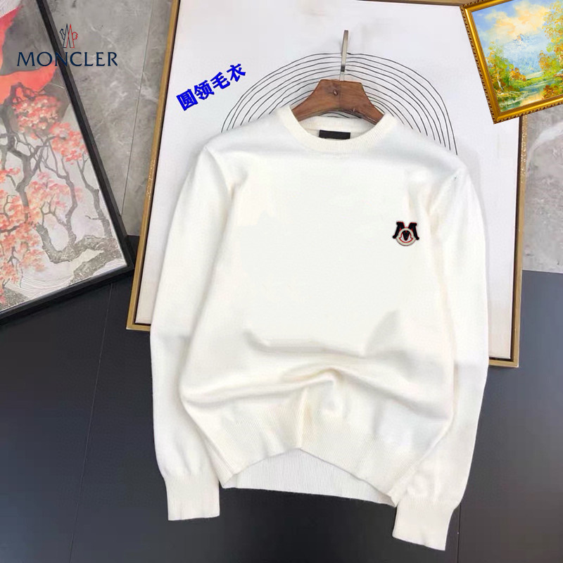 A pristine white crewneck sweater featuring a small designer-style logo on the chest, displayed on a flat surface with artistic backgrounds.