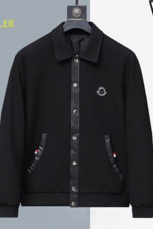 Close-up of the premium black fabric, leather pocket trim, and the iconic tri-color ribbon detail on a designer-inspired jacket.