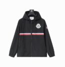 A black hooded sport windbreaker jacket featuring a horizontal red, white, and navy stripe across the chest and a white circular logo emblem.