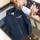 Black Moncler-style hooded jacket with "Founded in 1952" text on the chest and a utility pocket with a logo patch on the sleeve.